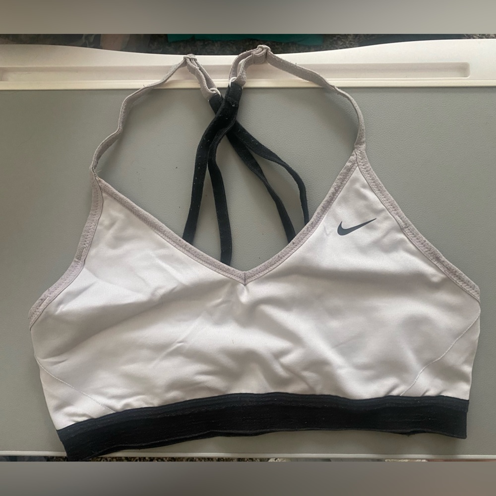 White sports bra with black straps